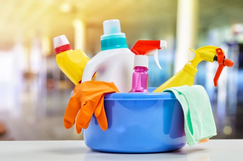 Cleaner using approved equipment with PPE